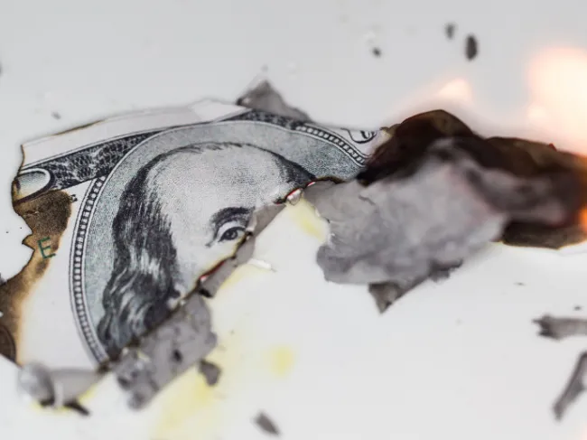 burning dollar bill
